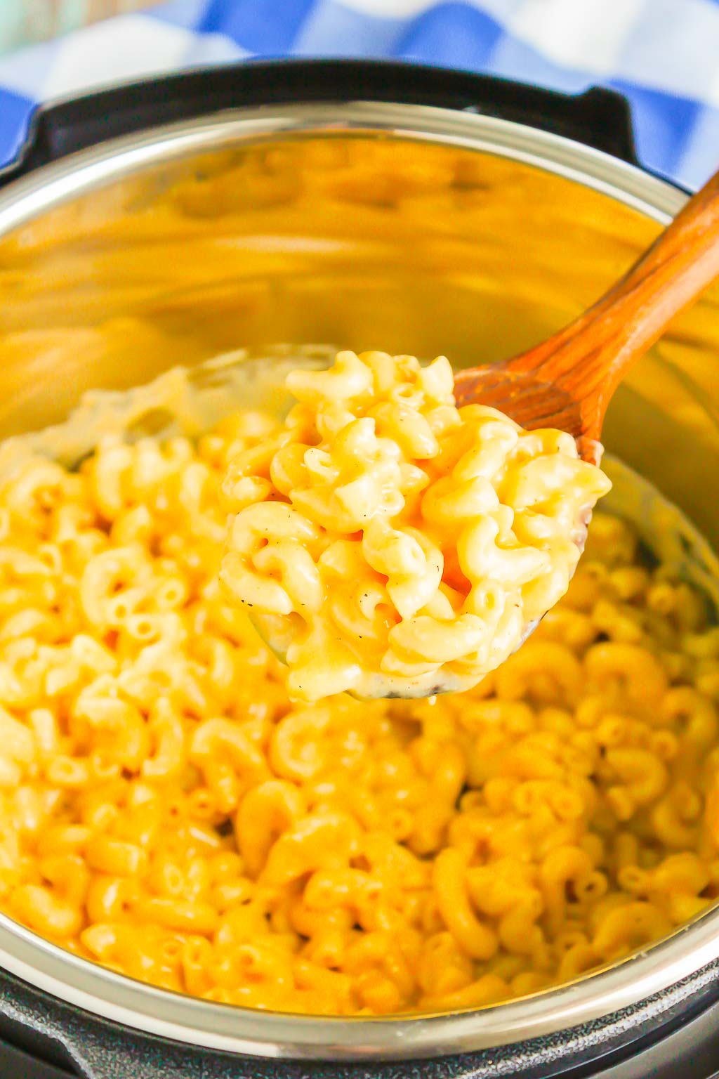 mac and cheese in instant pot with wood spoon
