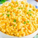 Instant Pot Creamy Macaroni and Cheese is hearty, comforting, and ready in less than 20 minutes. Made with just a few ingredients and ready in no time, it's creamy, cheesy, and so easy to make! #macaroniandcheese #macncheese #instantpotrecipes #instantpotmacaroniandcheese #instantpotmacandcheese #instantpotmacncheese #sidedish #creamymacandcheese #thanksgiving #dinner