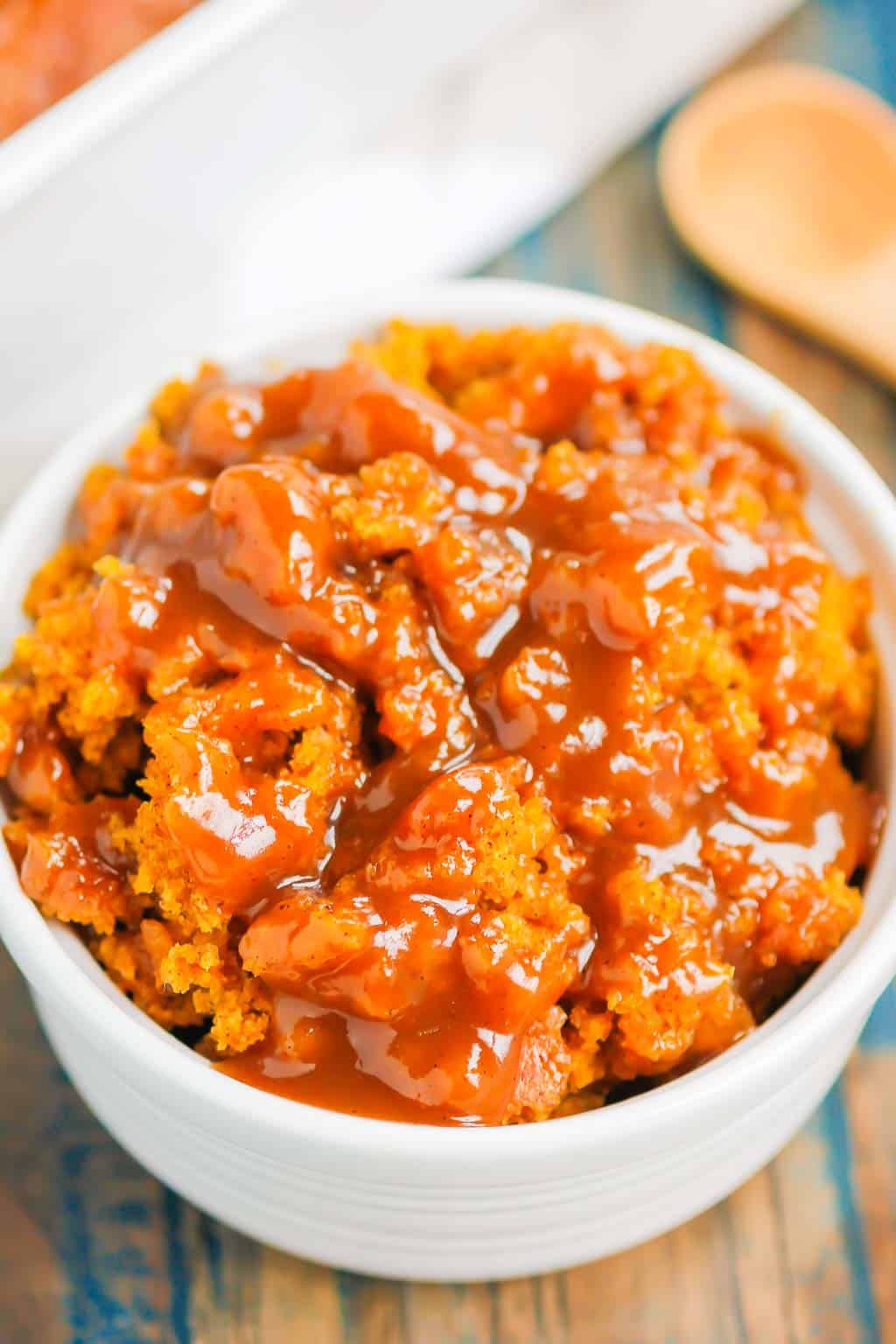 Pumpkin Cobbler is a simple dessert that's bursting with cozy flavors. With a soft, pumpkin cake on top and a decadent, caramel sauce on the bottom, this dish is perfect for fall! #cobbler #pumpkincobbler #cobblerrecipe #pumpkindessert #thanksgivingdessert #falldessert