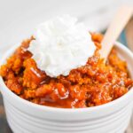 Pumpkin Cobbler is a simple dessert that's bursting with cozy flavors. With a soft, pumpkin cake on top and a decadent, caramel sauce on the bottom, this dish is perfect for fall! #cobbler #pumpkincobbler #cobblerrecipe #pumpkindessert #thanksgivingdessert #falldessert