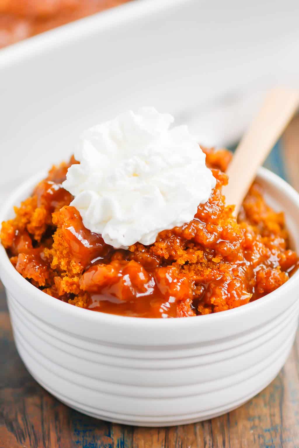 Pumpkin Cobbler is a simple dessert that's bursting with cozy flavors. With a soft, pumpkin cake on top and a decadent, caramel sauce on the bottom, this dish is perfect for fall! #cobbler #pumpkincobbler #cobblerrecipe #pumpkindessert #thanksgivingdessert #falldessert