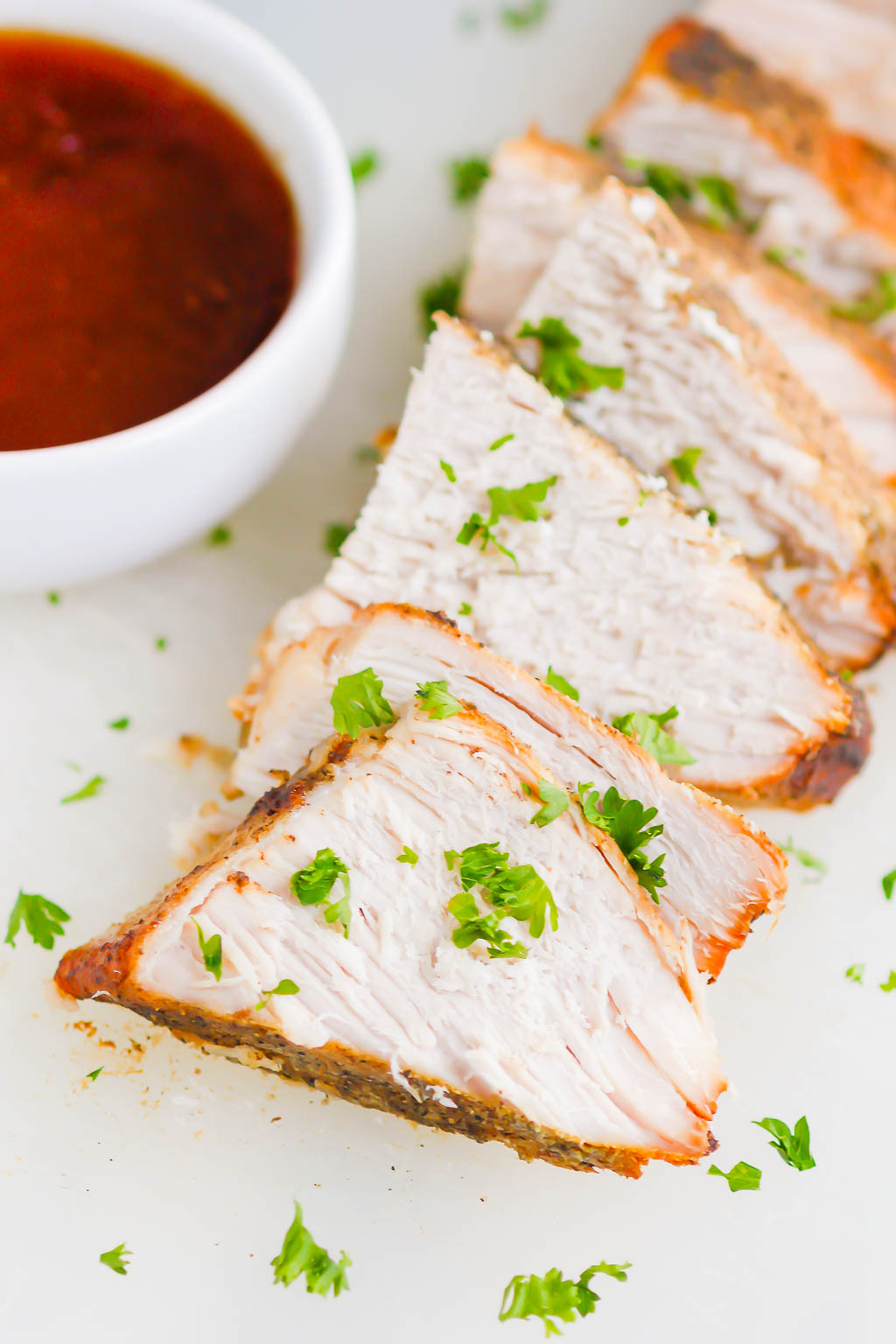 Slow Cooker Honey Balsamic Pork Loin is a simple dish that's loaded with cozy flavors. Made with just a few ingredients, this pork comes out tender, juicy, and drizzled with the most delicious honey balsamic glaze! #pork #porkrecipe #porkloin #porkloinrecipe #porkroast #slowcookerporkroast #slowcookerpork #honeybalsamic #honeybalsamicpork #balsamicpork #fallrecipes #falldinners #easydinners