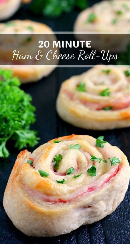 These Baked Ham and Cheese Roll-Ups contain just three ingredients and are ready in less than 20 minutes. Filled with deli ham, Swiss cheese, and rolled up in a pre-made pizza dough, these roll-ups are sure to be the hit of the dinner table! #ham #cheese #rollup #hamcheese #hamappetizer #appetizer #snack