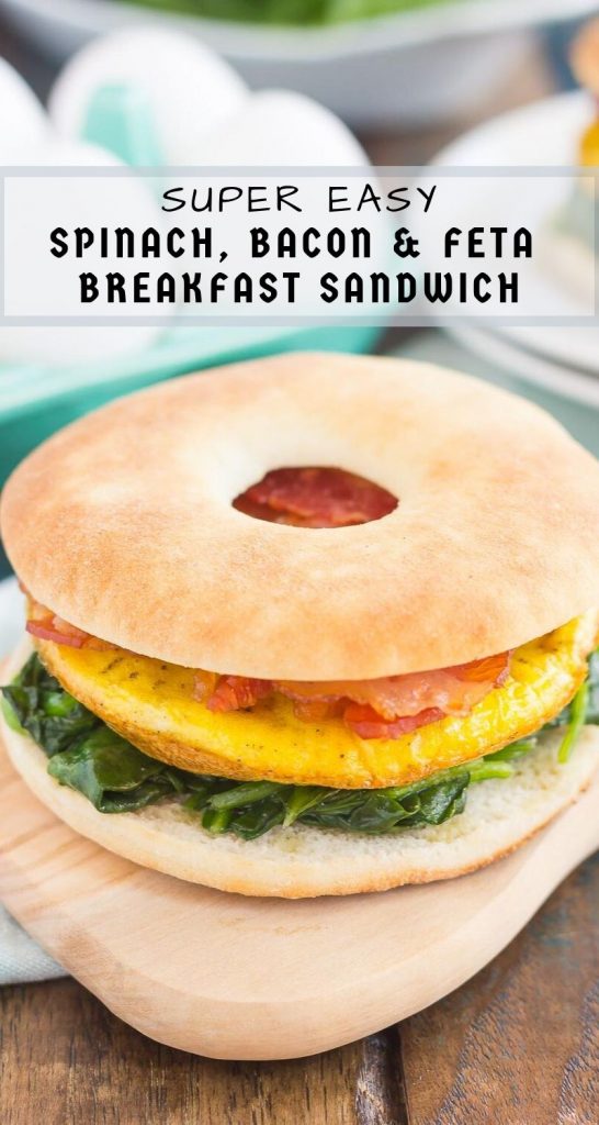 This Spinach, Bacon and Feta Breakfast Sandwich is an easy, make-ahead dish that's full of fresh ingredients. Fluffy eggs are seasoned with creamy feta cheese, and then topped sautéed spinach and smoky bacon. This sandwich makes a delicious and hearty breakfast for those busy weekday mornings! #sandwich #breakfastsandwich #bagelsandwich #eggbaconsandwich #eggsandwich #breakfast