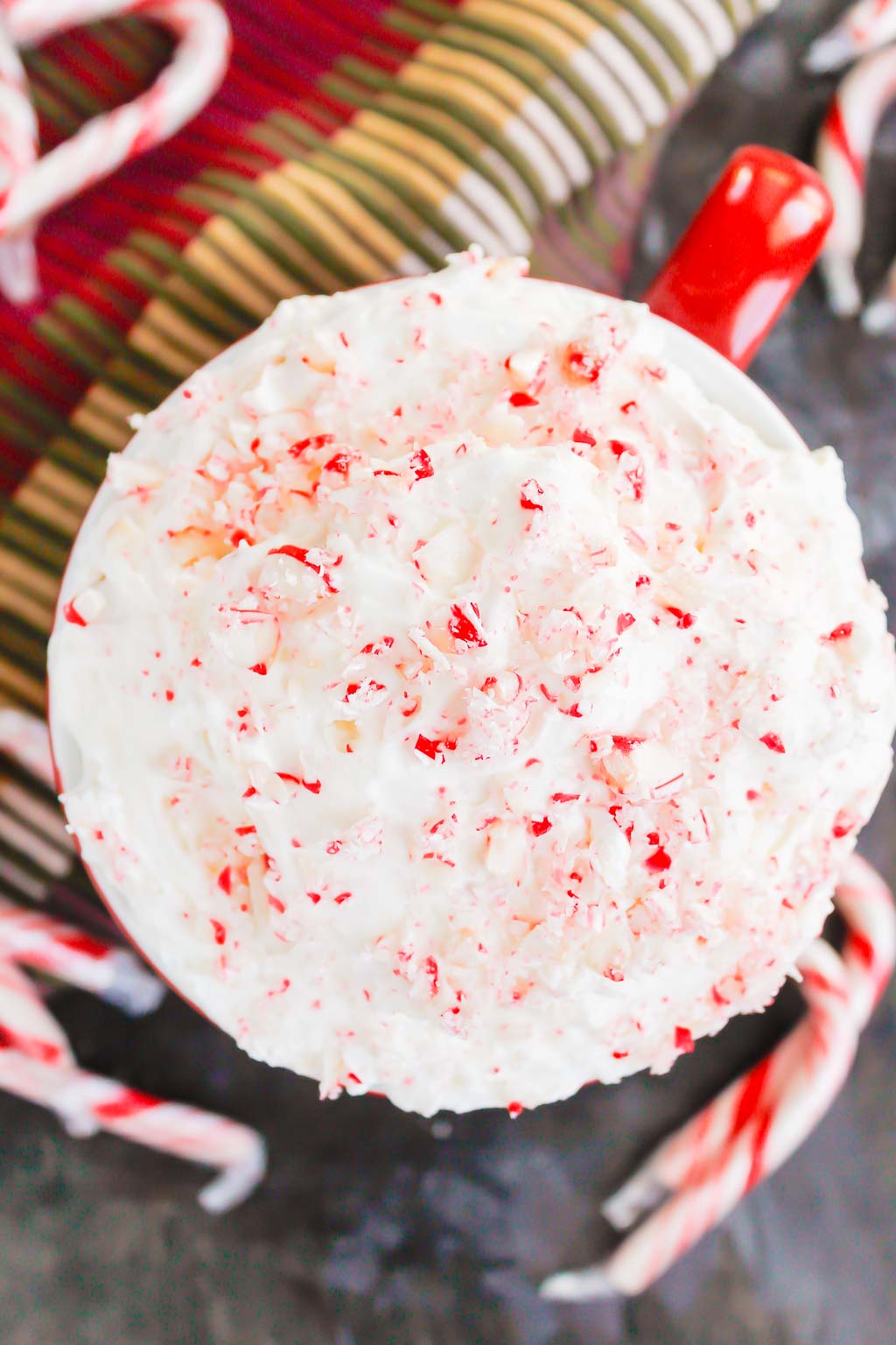 You're going to fall in love with how easy and delicious this Peppermint Cheesecake Dip recipe is to make. Itâ€™s a bright and refreshing dessert option for your holiday table. This treat mixes up in minutes and will be a hit with everyone! #peppermint #peppermintdip #peppermintcheesecake #peppermintcheesecakedip #candycanedip #dessert #christmasdessert #holidaydessert