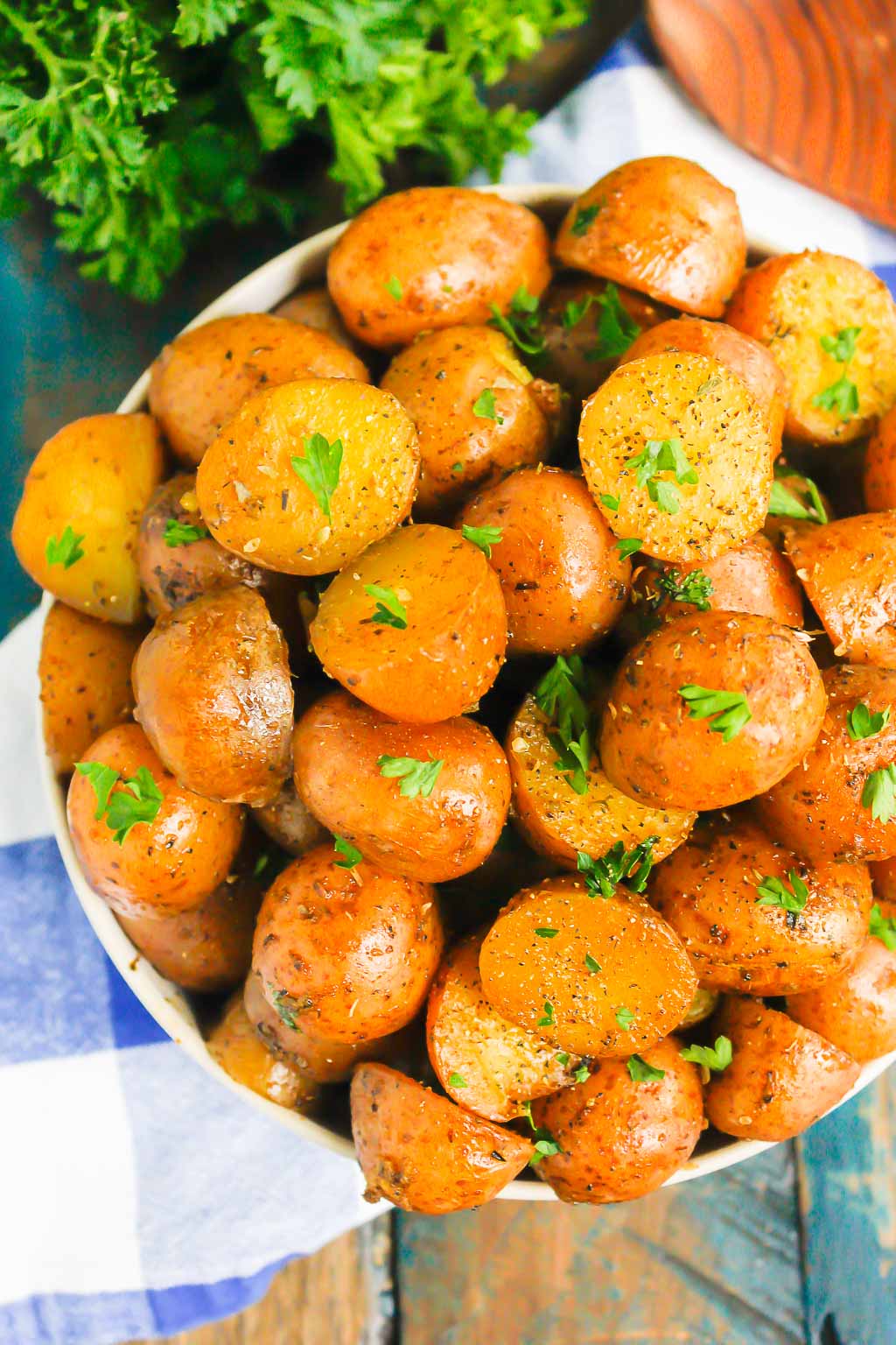 overhead view of serving dish piled high with instant pot red potatoes