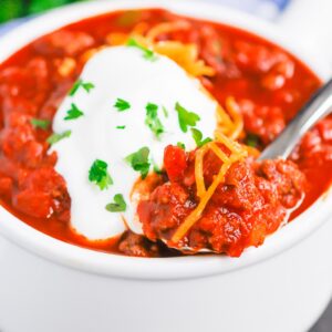 Instant Pot No Bean Chili is a simple, hearty meal that's ready in no time. Made with two types of ground beef and loaded with flavor, you'll never miss the beans in this cozy dish! #chili #nobeanchili #chilinobeans #instantpot #instantpotchili #Instantpotnobeanchili #dinner #comfortfood