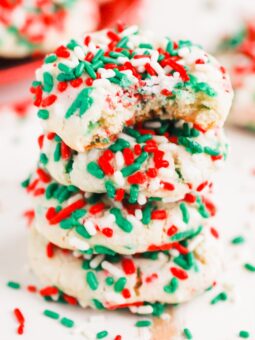Sprinkle Cookies are an upgrade on classic sugar cookies that you'll want to make year round. Perfectly soft and sweet, this treat is easy to make and perfect for the holidays! #cookies #sprinklecookies #cookierecipe #sugarcookies #sprinklecookierecipes #bestsugarcookies #holidaycookies #christmascookies #dessert #christmasdessert #holidaydessert