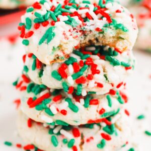 Sprinkle Cookies are an upgrade on classic sugar cookies that you'll want to make year round. Perfectly soft and sweet, this treat is easy to make and perfect for the holidays! #cookies #sprinklecookies #cookierecipe #sugarcookies #sprinklecookierecipes #bestsugarcookies #holidaycookies #christmascookies #dessert #christmasdessert #holidaydessert