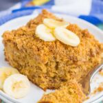 Banana Coffee Cake makes the most delicious breakfast or dessert. Sweet bananas are packed into a soft and fluffy cake and studded with a crispy cinnamon streusel topping. It's easy to make and perfect for just about any time! #cake #coffeecake #coffeecakerecipe #bananacoffeecake #bananacake #bananacrumbcake #bananadessert #bananabreakfast #bananarecipe #breakfast #dessert