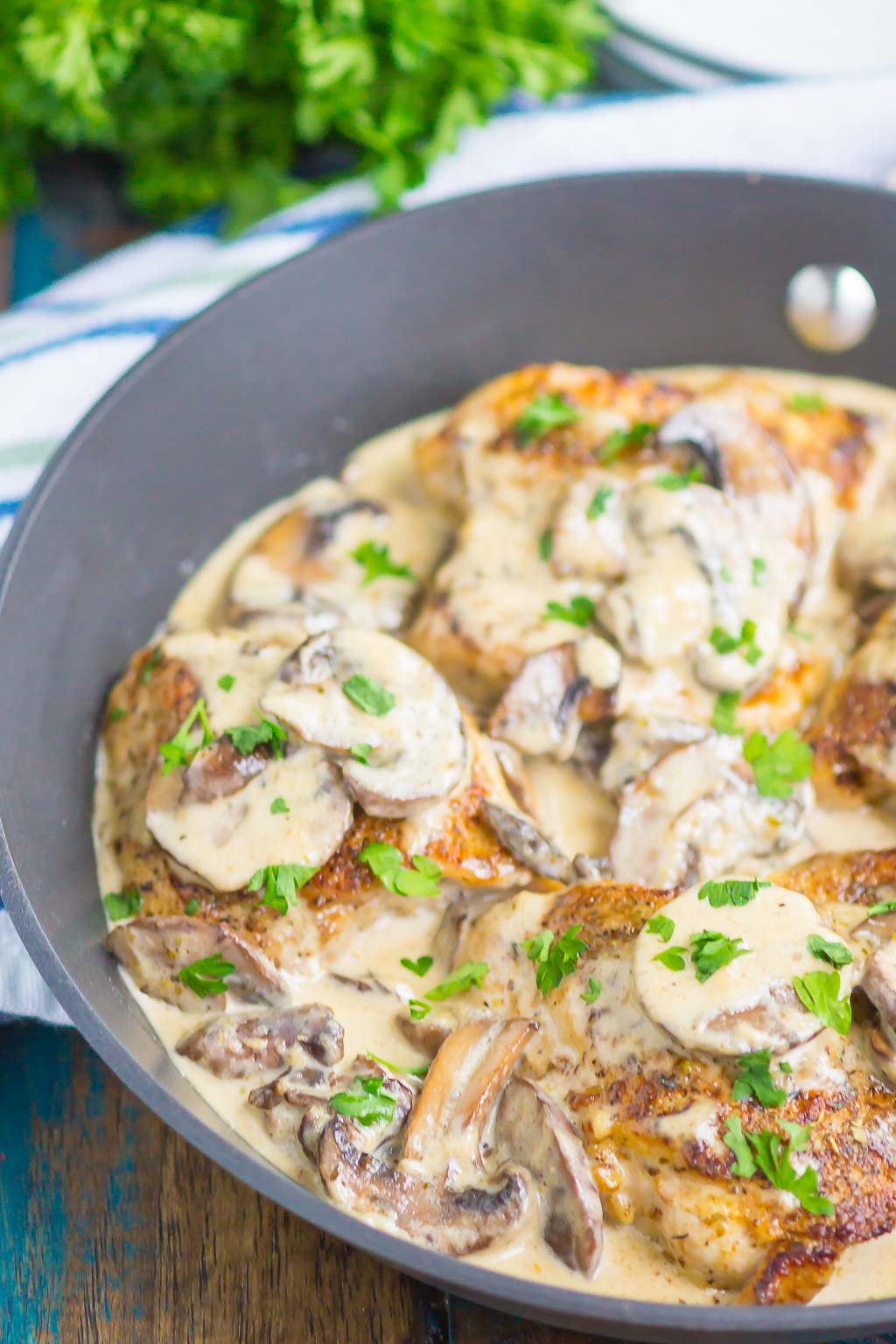 creamy garlic mushroom chicken in a skillet