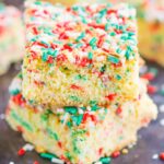 Holiday Cake Mix Bars make a simple, one bowl treat that's ready in no time. With just a few ingredients, these bars bake up soft, chewy, and all-around delicious! #cake #cakebars #cakerecipe #cakebarrecipe #easycakerecipe #holidaycake #holidaydessert #christmascake #christmasdessert #dessert