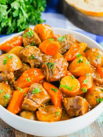 Instant Pot Beef Stew is a simple, hearty dish that's full of cozy flavors. Tender beef, potatoes and carrots are tossed in a savory gravy that's ready in less than an hour. This easy meal will quickly become a dinner time favorite all year long!