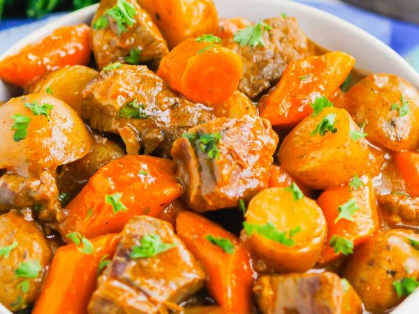 Instant Pot Beef Stew is a simple, hearty dish that's full of cozy flavors. Tender beef, potatoes and carrots are tossed in a savory gravy that's ready in less than an hour. This easy meal will quickly become a dinner time favorite all year long!
