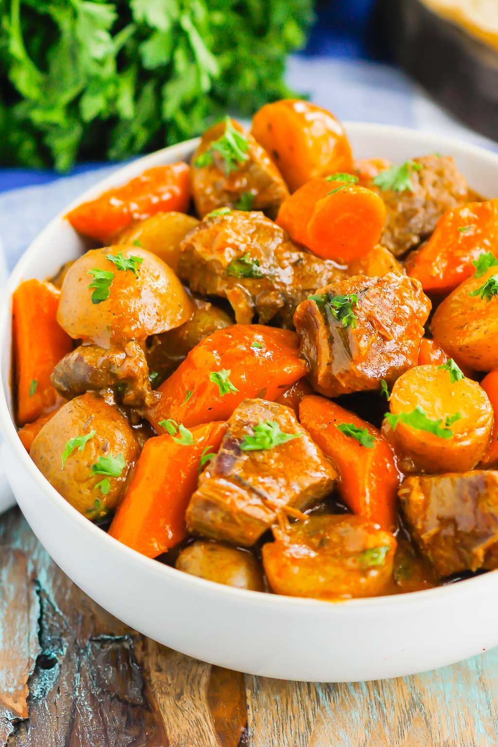 best instant pot beef stew in a white serving bowl