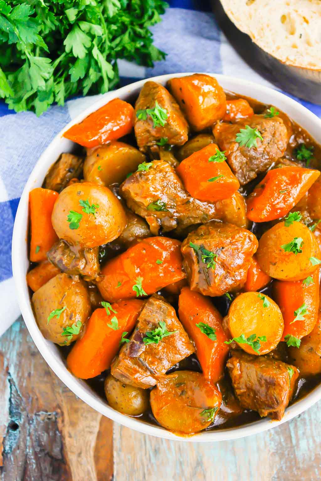 overhead view of instant pot stew in a white bowl