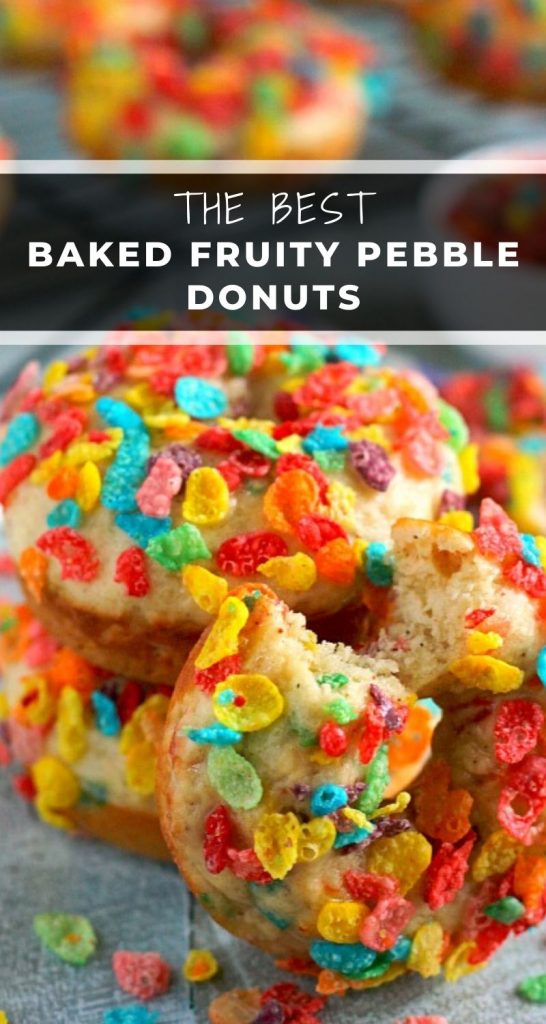 These Baked Fruity Pebble Donuts feature a fluffy vanilla batter, packed with sweet Fruity Pebbles. The donuts are baked and then topped with a rich, vanilla glaze. Healthier than the fried kind and so delicious, these treats will bring out the kid inside of you! #donuts #bakeddonuts #donutrecipe #fruitypebbledonuts #fruitypebblerecipe #breakfast #dessert