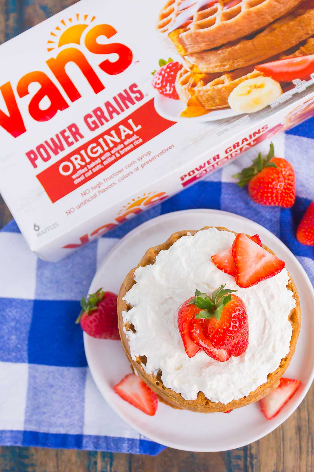 Strawberry Shortcake Waffles make a deliciously sweet and easy breakfast. Made with fresh strawberries, and whipped cream sweetened with honey, this dish is the perfect way to start your day!