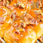 Caramel Sticky Buns are soft, sweet, and ready in just 30 minutes. Sweet rolls are topped with a rich caramel sauce, chopped pecans, and then baked until golden. Perfect for breakfast or dessert! #stickybuns #sweetrolls #caramelstickybuns #caramelrolls #breakfast #dessert