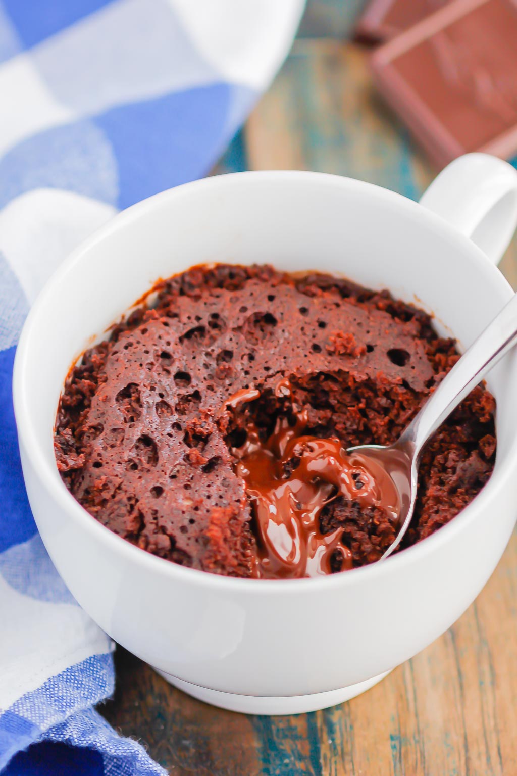 Chocolate Lava Mug Cake is moist and fudgy, with a warm molten center. Made in the microwave and ready in minutes, this easy treat is perfect for chocolate lovers!