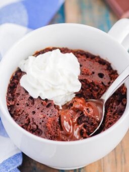 Chocolate Lava Mug Cake is moist and fudgy, with a warm molten center. Made in the microwave and ready in minutes, this easy treat is perfect for chocolate lovers! #mugcake #chocolatemugcake #chocolatelavamugcake #lavacake #lavamugcake #bestmugcake #dessert