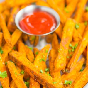 Crispy Baked Sweet Potato Fries are easy to make and seasoned to perfection. Healthier than the fried version and so delicious, these crunchy fries are perfect for a simple snack or side dish!