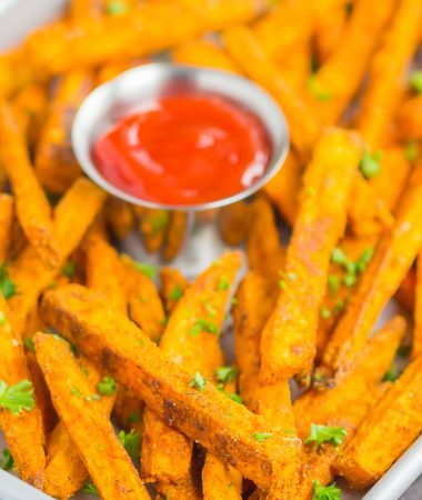 Crispy Baked Sweet Potato Fries are easy to make and seasoned to perfection. Healthier than the fried version and so delicious, these crunchy fries are perfect for a simple snack or side dish!