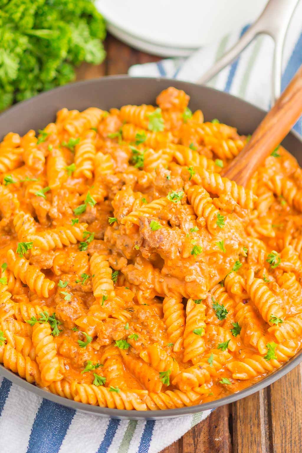 ground beef pasta in skillet on top of tea towel