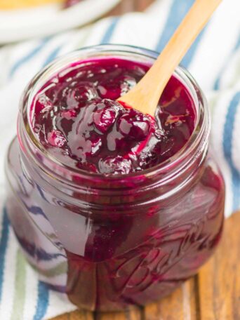 Easy Blueberry Sauce is made with just five ingredients and ready in no time. This simple sauce is the perfect topping for toast, waffles, pancakes, ice cream, and so much more!