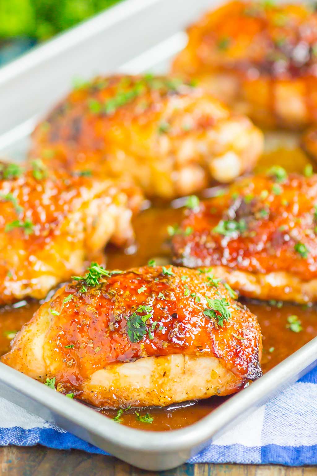 honey balsamic chicken thighs on a baking tray