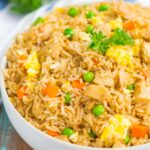 Instant Pot Chicken Fried Rice is a simple, one pot recipe that's ready in no time. With just a few ingredients, this dish is perfect for meal prepping, lunch, or dinner!