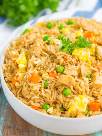 Instant Pot Chicken Fried Rice is a simple, one pot recipe that's ready in no time. With just a few ingredients, this dish is perfect for meal prepping, lunch, or dinner!