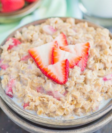 Strawberries and Cream Oatmeal is a deliciously simple way to start your day. With just a few ingredients and ready in minutes, this sweet and creamy oatmeal will keep you going all morning long! #oatmeal #strawberryoatmeal #strawberriesandcreamoatmeal #stovetopoatmeal #oatmealrecipes #breakfast #breakfastrecipes
