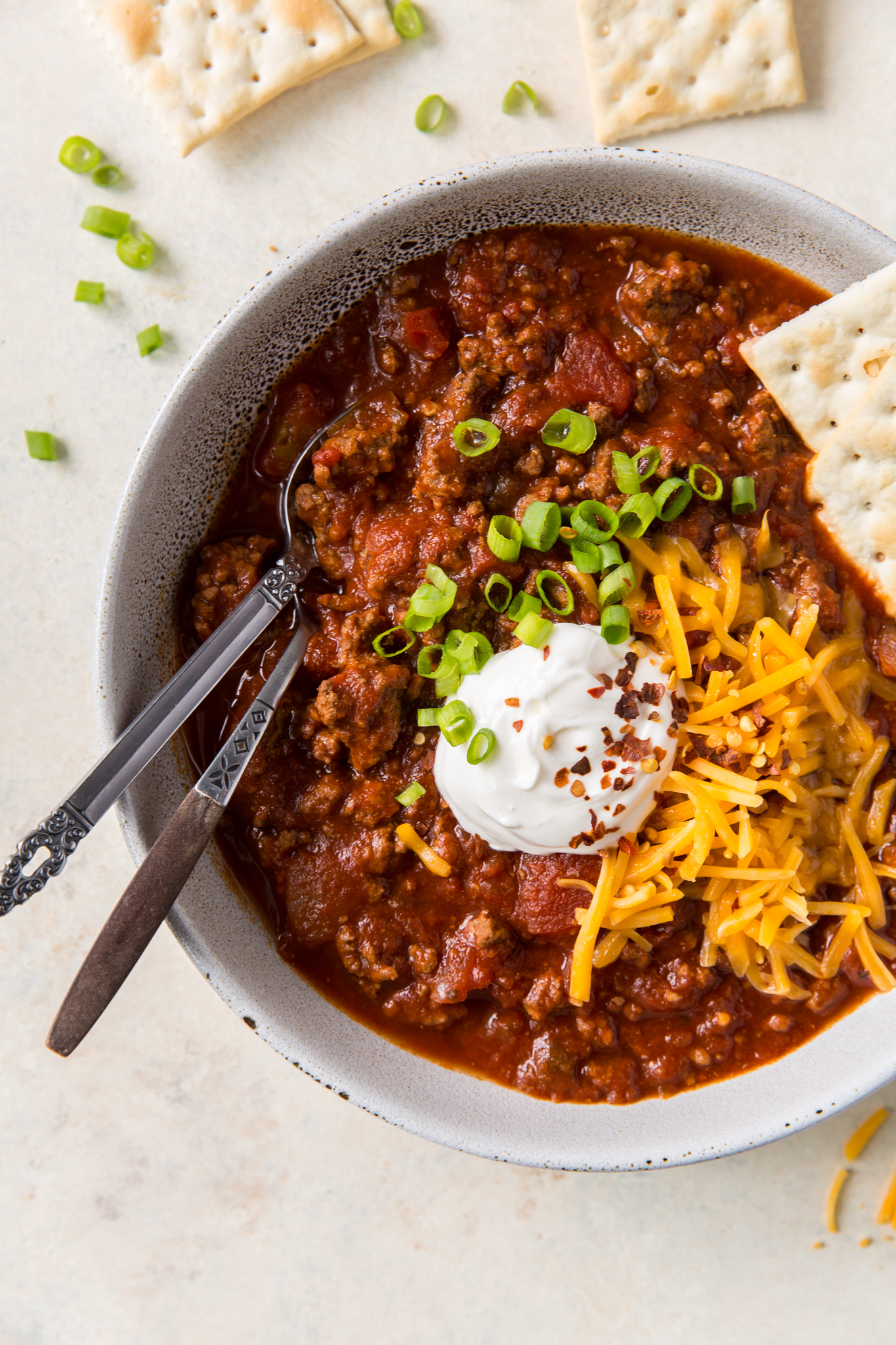 Overhead view of a big bowl of homemade chili made with no beans.