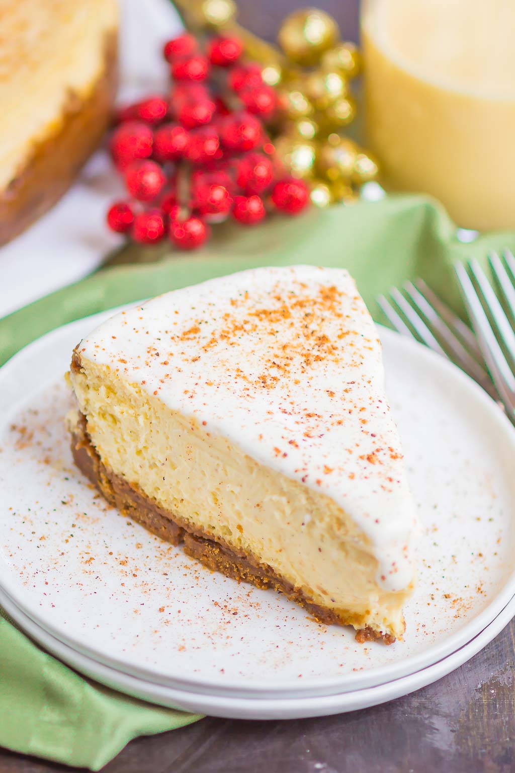 a slice of holiday cheese on a white dessert plate 