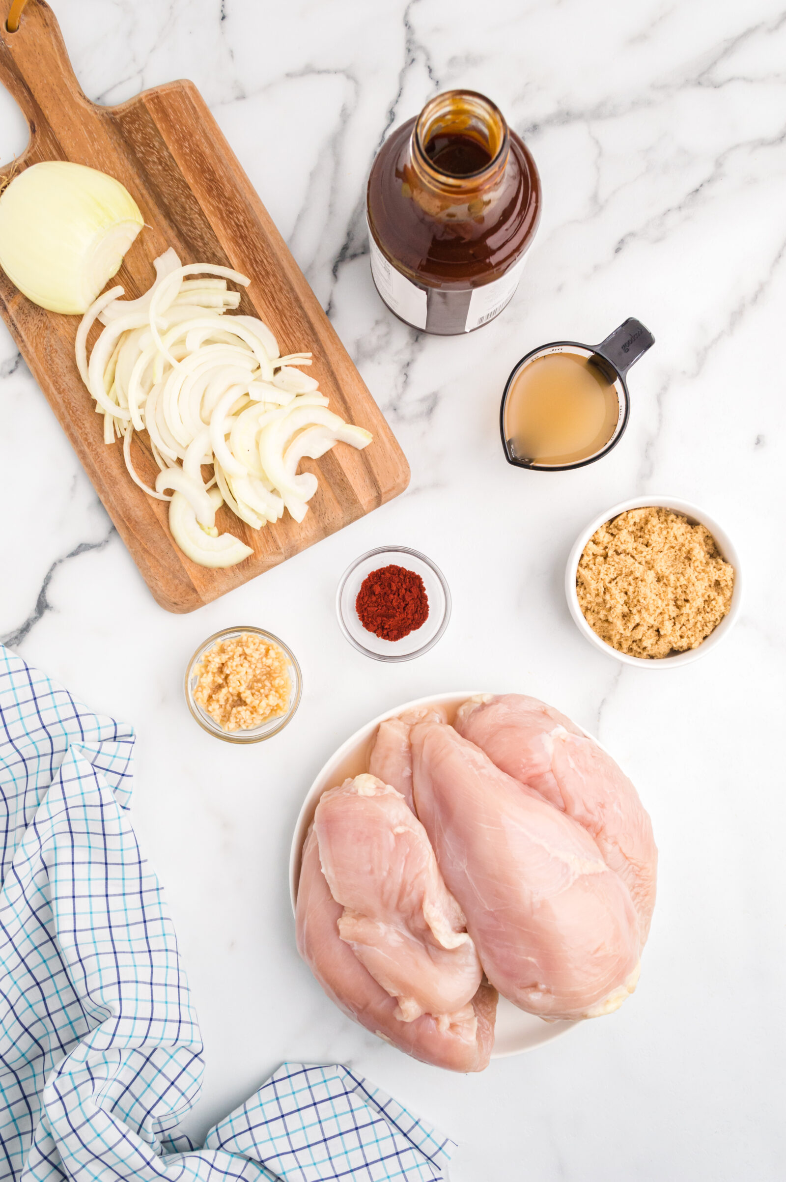 chicken ingredients on a white counter