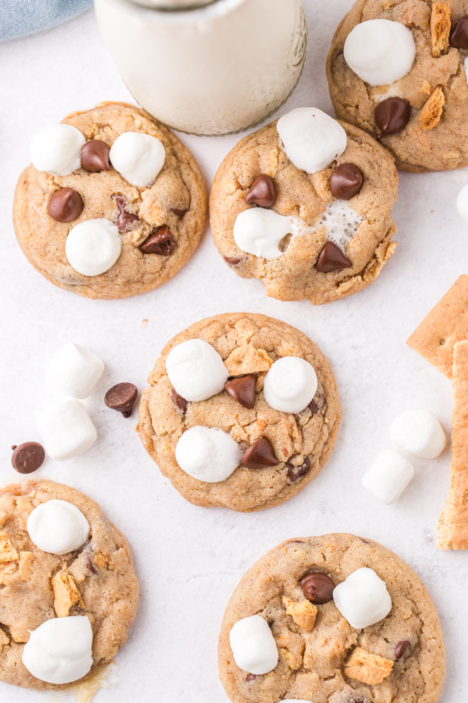 chocolate chip s'mores cookies on white surface