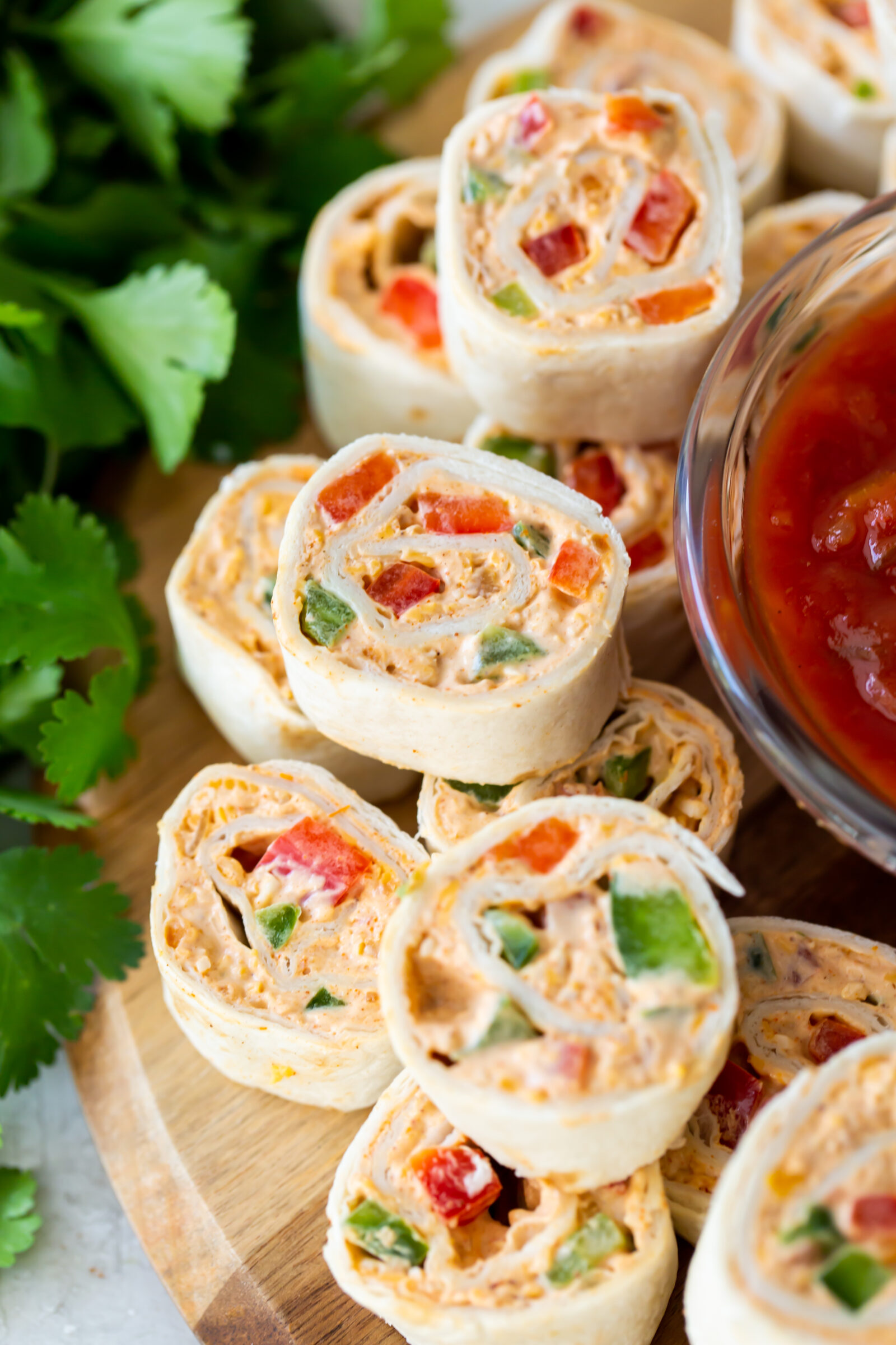 pinwheels on wooden tray