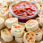 pinwheels on a wooden tray