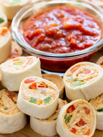 pinwheels on a wooden tray