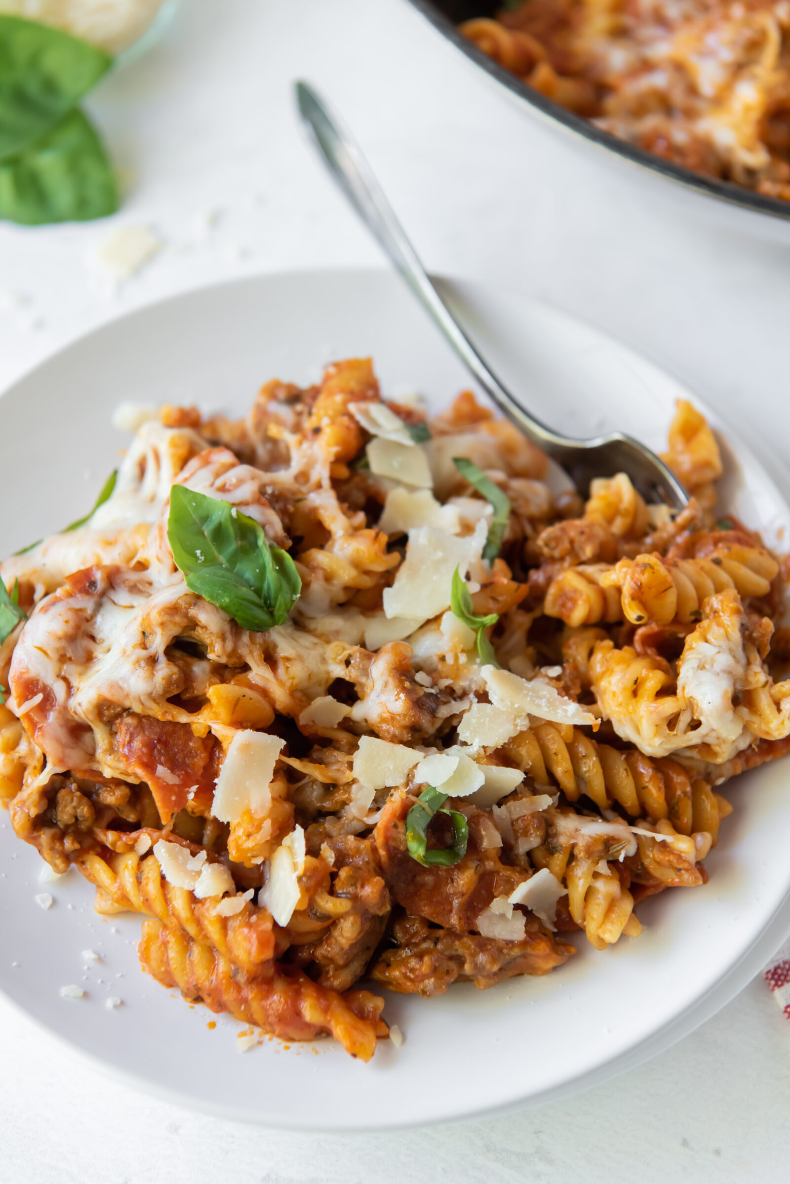 pizza pasta on a white plate