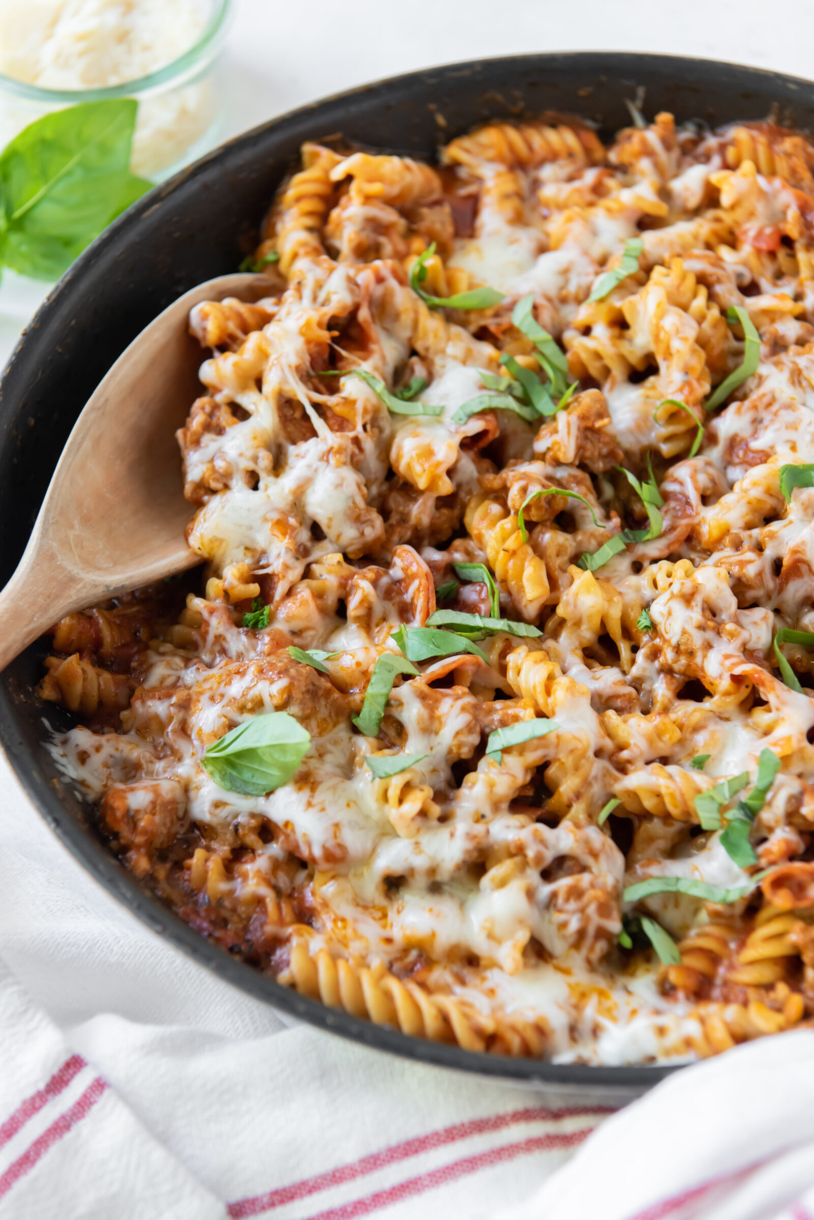 pizza pasta in a black pan