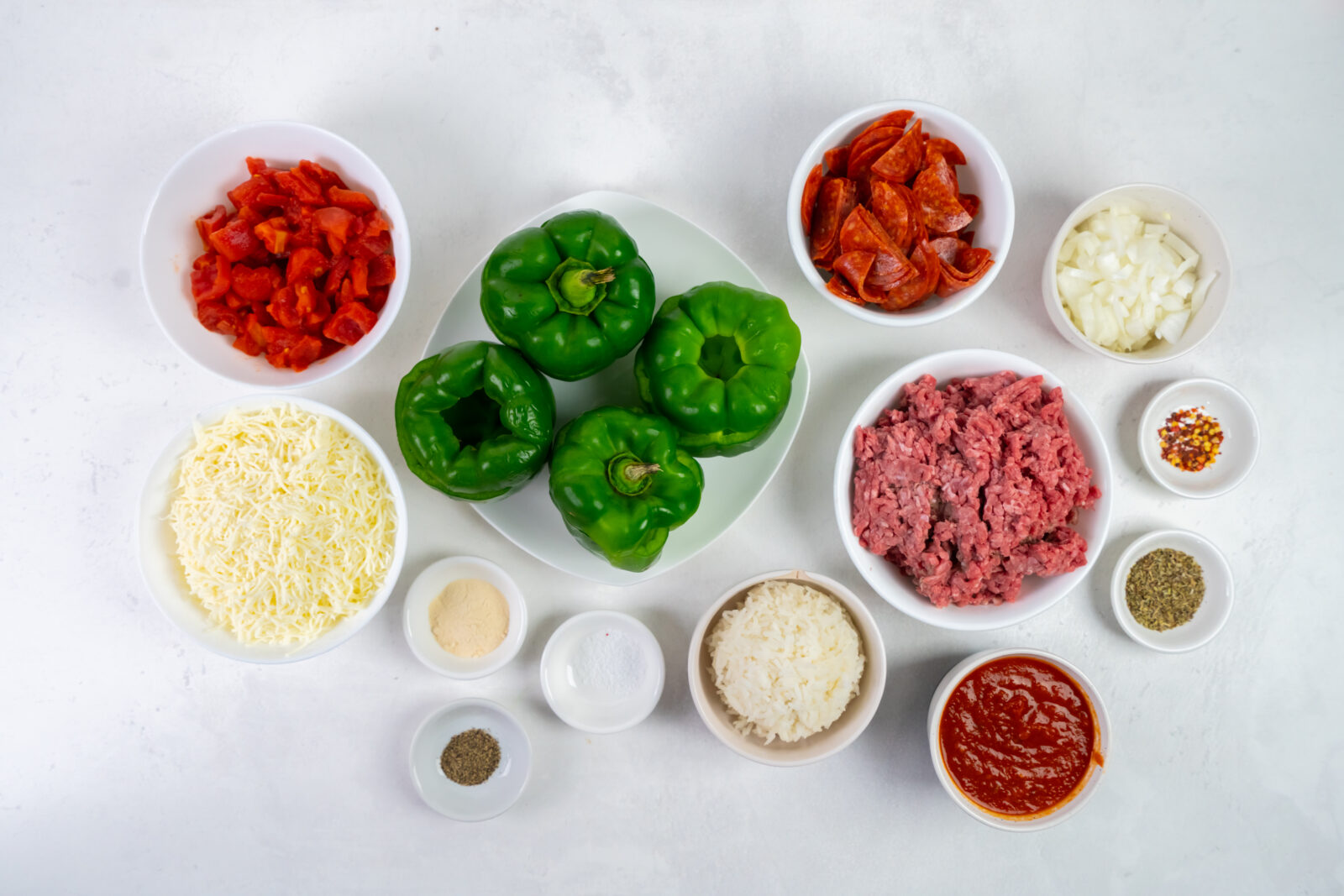 Overhead view of the ingredients needed to make pizza stuffed peppers in an Instant Pot. 