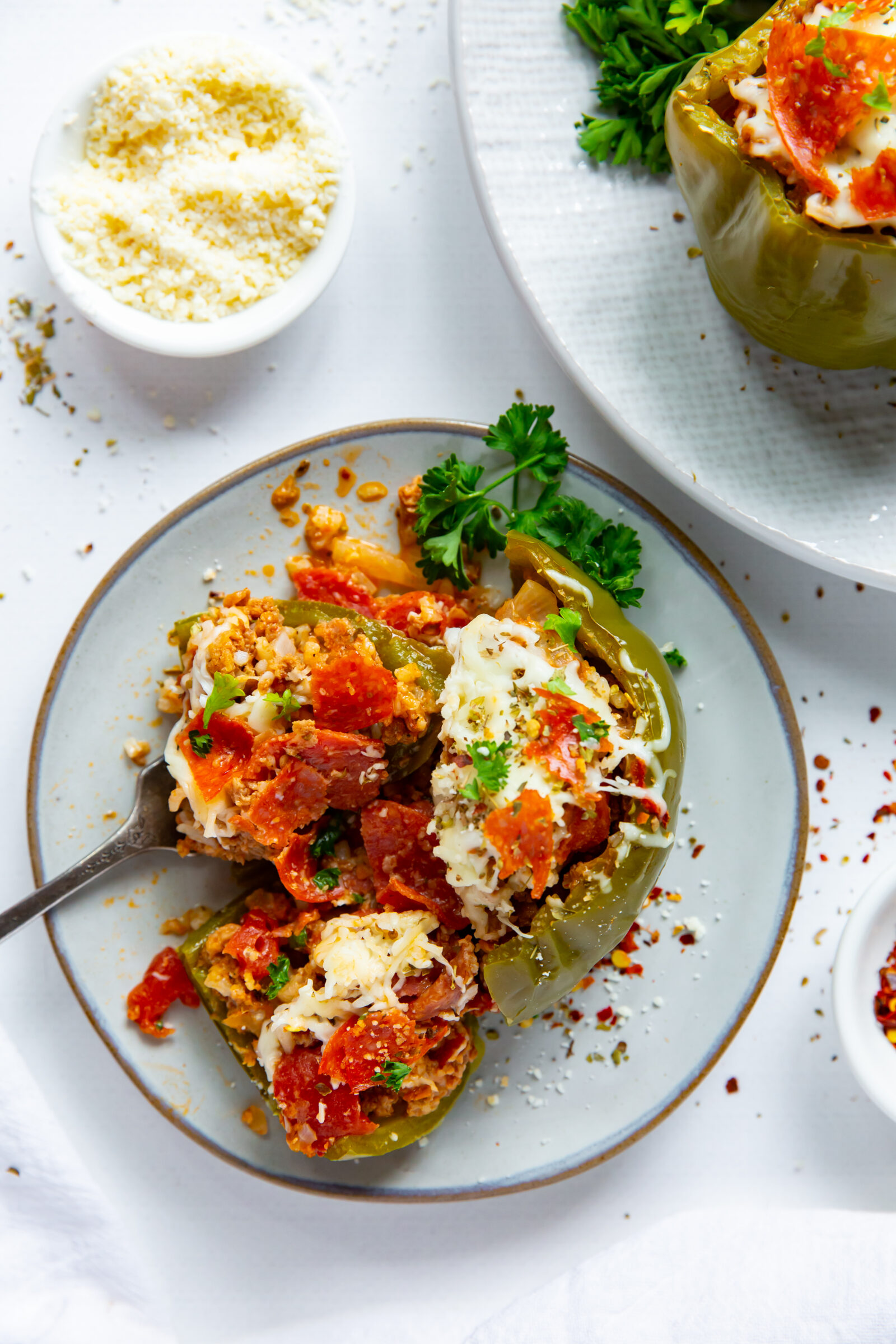 An Instant Pot stuffed pepper on a plate, seen from above. 