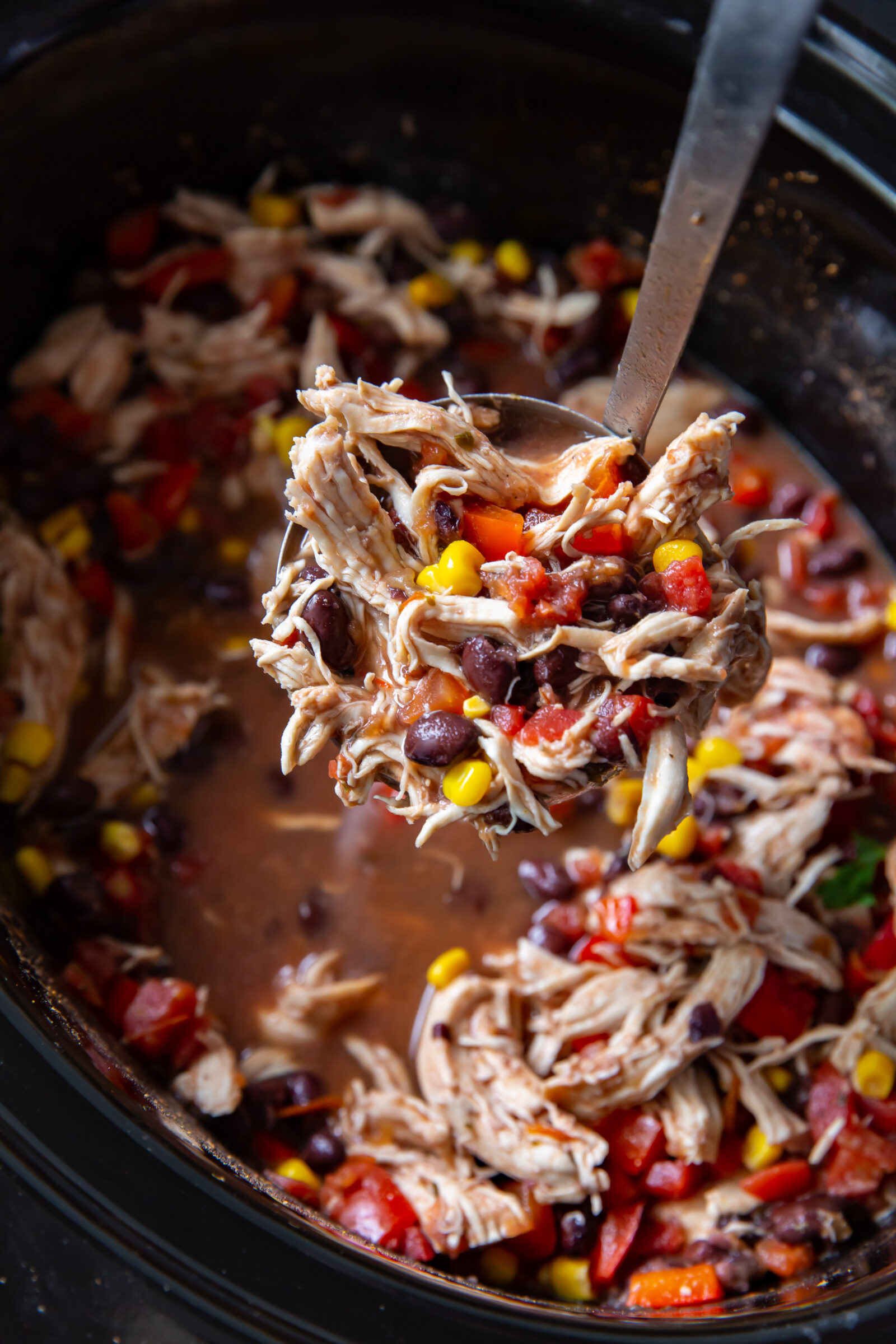 Crockpot southwest chicken being ladled out. 