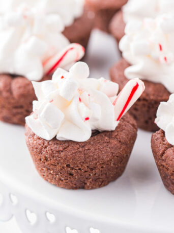 cookie cups on a white cake plate