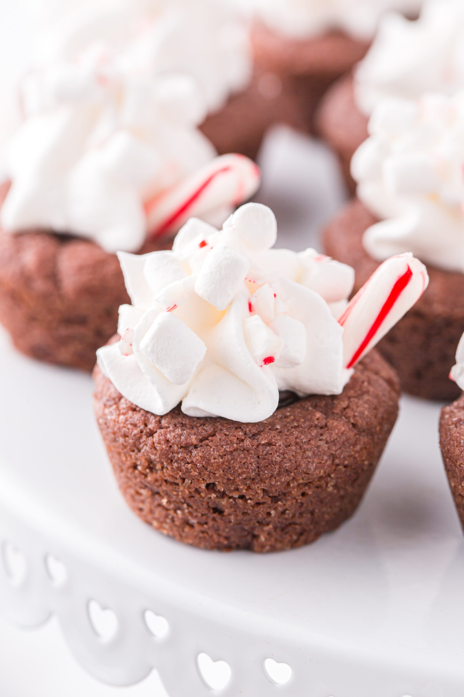 cookies on a white cake plate