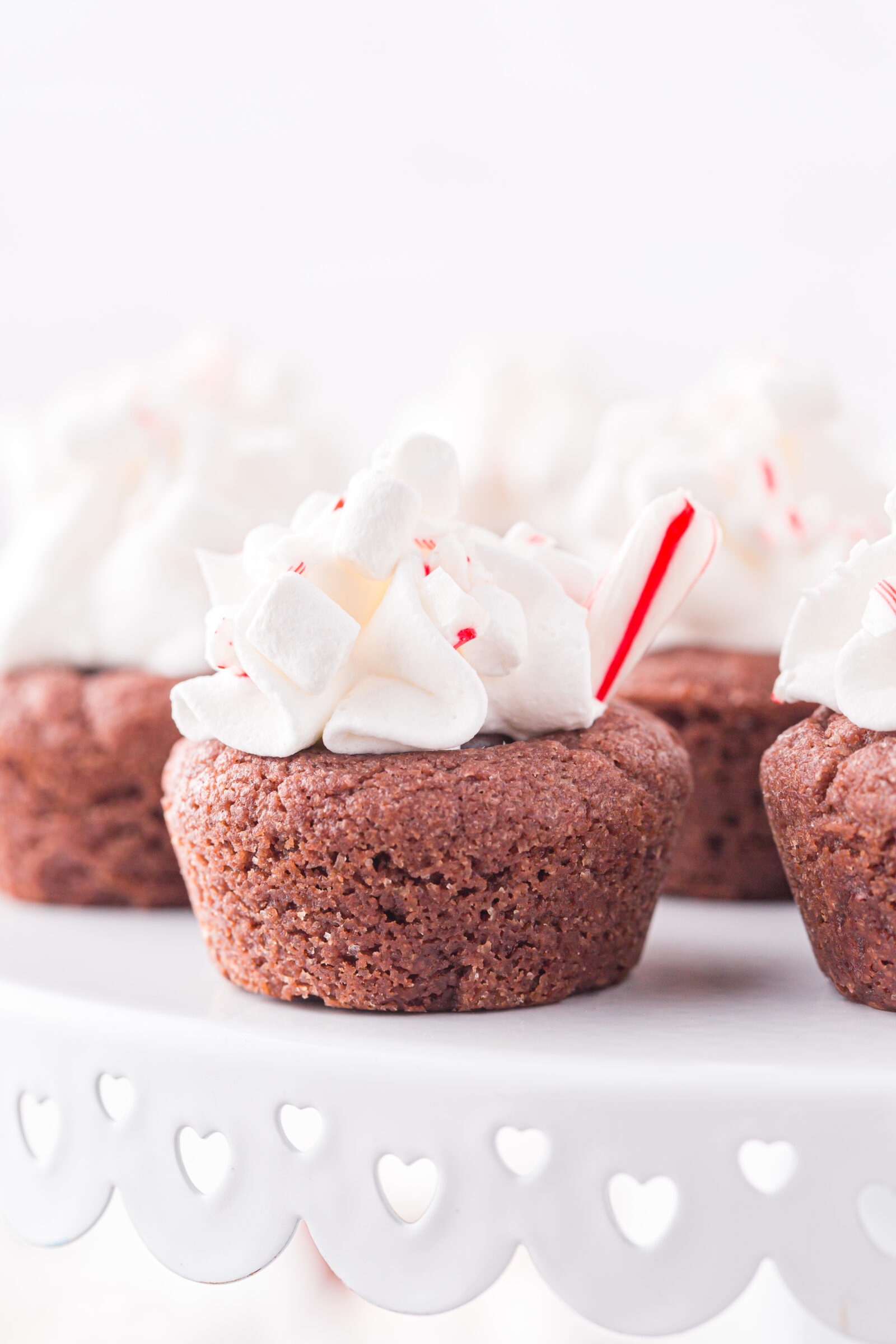 cookie cups on a white cake plate