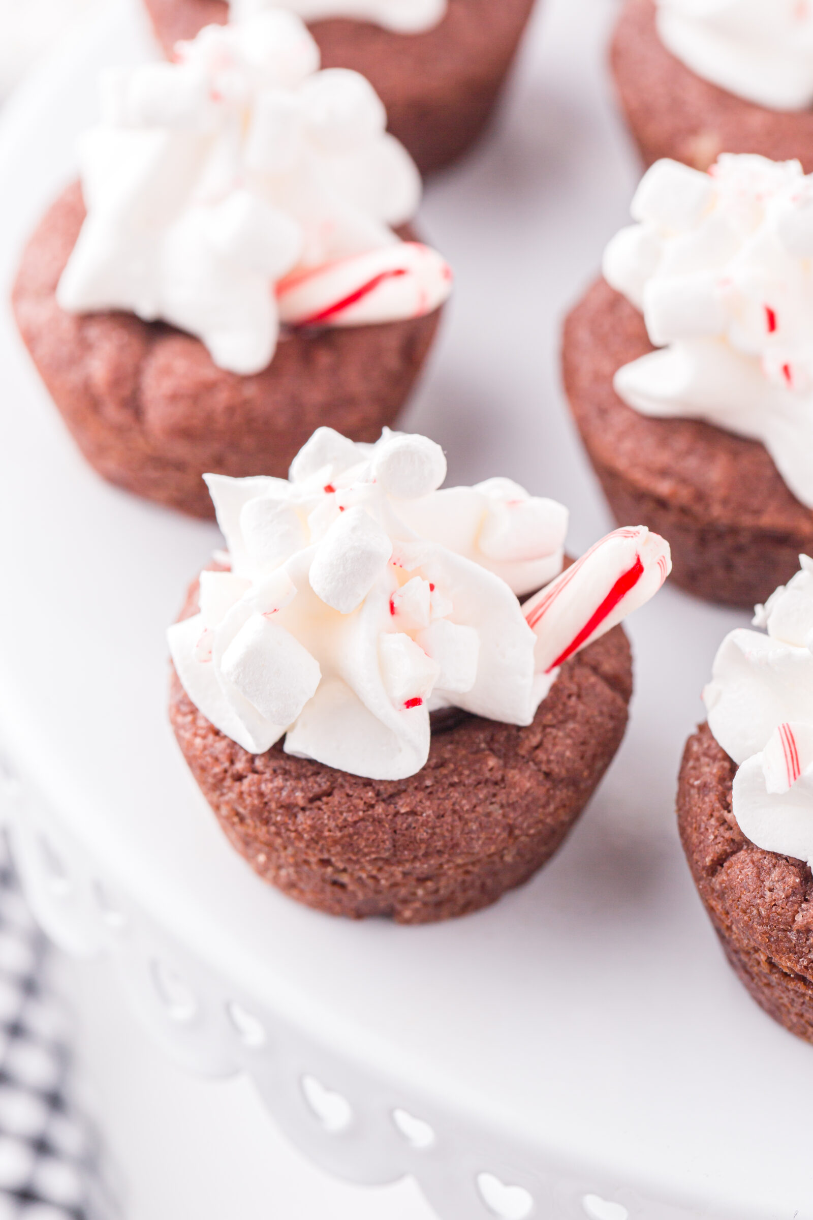 cookie cups on a white cake plate