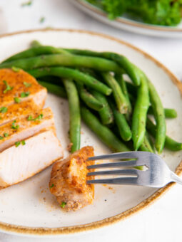 pork chops on a white plate